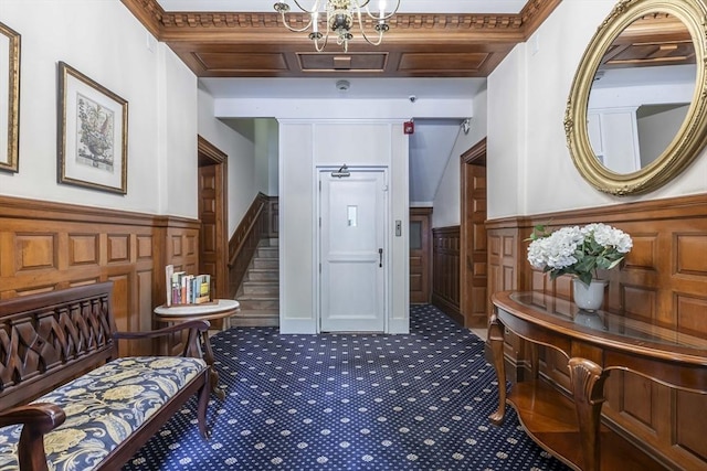 interior space featuring beam ceiling, crown molding, and a chandelier