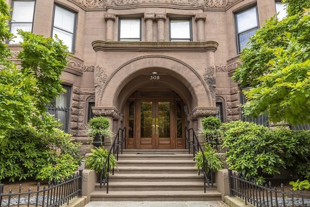 doorway to property featuring french doors