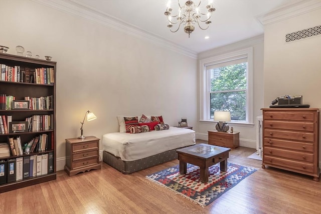 bedroom with an inviting chandelier, light hardwood / wood-style floors, and ornamental molding