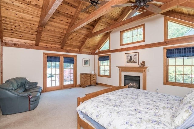 271 Rte 87, Columbia, CT 06237 - carpeted bedroom featuring wooden ceiling with exposed beams, access to outside, high vaulted ceiling, and a glass covered fireplace