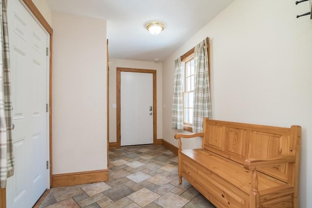 271 Rte 87, Columbia, CT 06237 - entryway featuring baseboards and light stone finish flooring