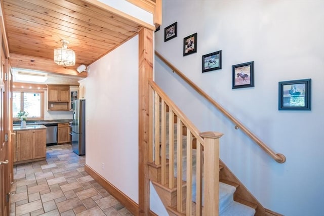 271 Rte 87, Columbia, CT 06237 - stairway featuring wooden ceiling, stone finish flooring, and baseboards