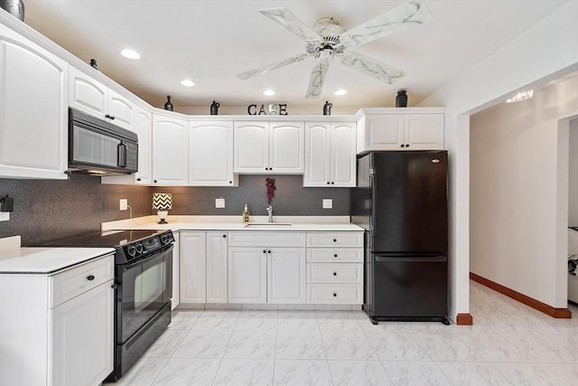 0 E Border Cir, Medford, MA 02155 - kitchen featuring black appliances, a sink, white cabinetry, light countertops, and recessed lighting