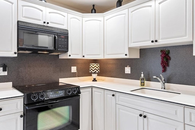 0 E Border Cir, Medford, MA 02155 - kitchen featuring black appliances, a sink, and white cabinets