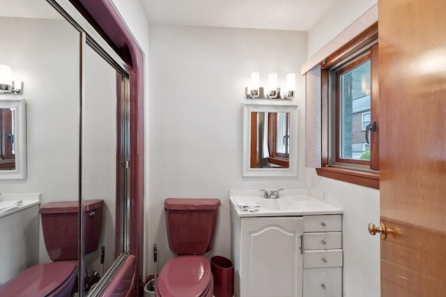 0 E Border Cir, Medford, MA 02155 - bathroom with toilet, vanity, and shower / bath combination with glass door