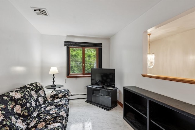 0 E Border Cir, Medford, MA 02155 - living area with a baseboard heating unit and light marble finish flooring