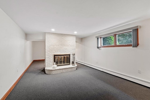 0 E Border Cir, Medford, MA 02155 - unfurnished living room with a baseboard heating unit, a brick fireplace, baseboards, carpet, and recessed lighting