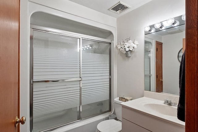 0 E Border Cir, Medford, MA 02155 - bathroom with vanity, shower / bath combination with glass door, and toilet