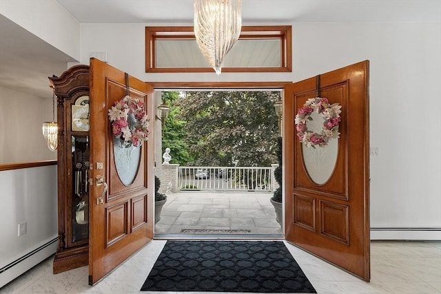 0 E Border Cir, Medford, MA 02155 - foyer featuring a baseboard heating unit and a chandelier