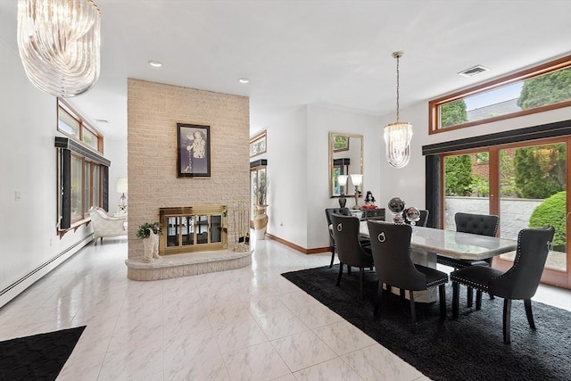 0 E Border Cir, Medford, MA 02155 - dining space with a chandelier, marble look tile flooring, a fireplace, baseboard heating, and baseboards