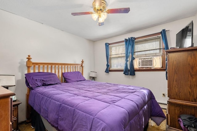 bedroom featuring cooling unit, ceiling fan, and a baseboard heating unit