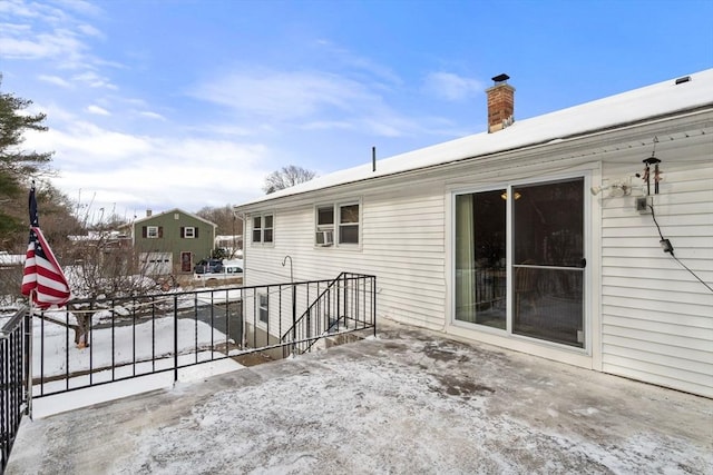 view of snow covered patio