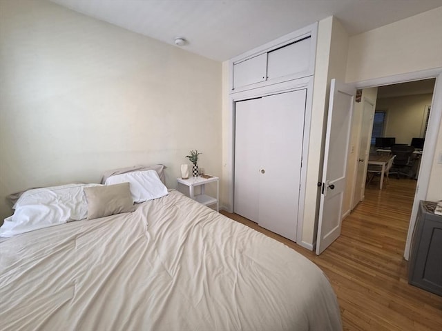 26 Unity St Unit 2, Boston, MA 02113 - bedroom with light wood-style flooring and a closet