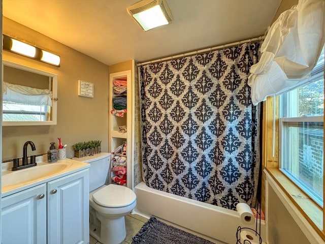 bathroom featuring shower / bath combo, vanity, toilet, and tile patterned floors