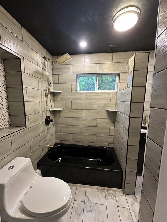 45 Carter Ave, Blackstone, MA 01504 - bathroom featuring toilet, shower / bath combination, and wood tiled floors