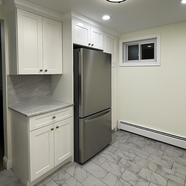 45 Carter Ave, Blackstone, MA 01504 - kitchen with freestanding refrigerator, light marble finish flooring, light countertops, white cabinets, and recessed lighting