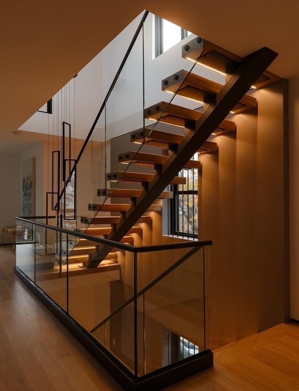 staircase featuring hardwood / wood-style flooring