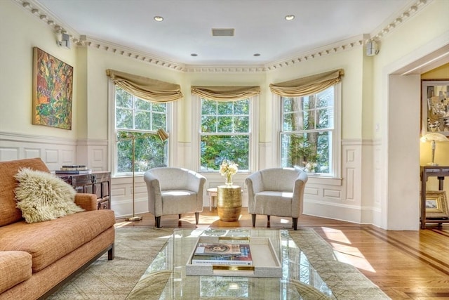 10 Sheffield Rd, Winchester, MA 01890 - sitting room with a decorative wall, wainscoting, wood finished floors, and recessed lighting