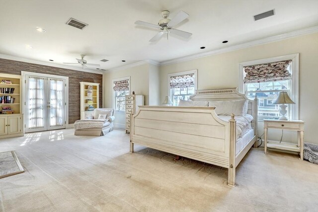 10 Sheffield Rd, Winchester, MA 01890 - bedroom with light carpet, crown molding, a ceiling fan, and french doors