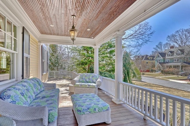 10 Sheffield Rd, Winchester, MA 01890 - wooden porch with an outdoor hangout area