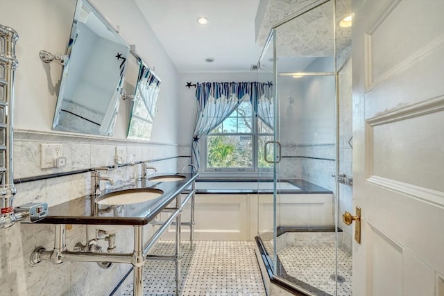 10 Sheffield Rd, Winchester, MA 01890 - bathroom with a shower stall, double vanity, tile patterned floors, and a wainscoted wall