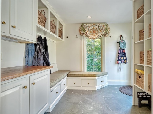 10 Sheffield Rd, Winchester, MA 01890 - mudroom featuring baseboards