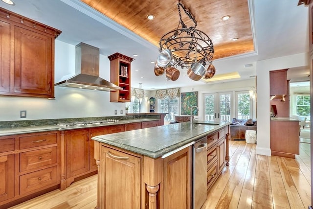 10 Sheffield Rd, Winchester, MA 01890 - kitchen featuring wall chimney exhaust hood, a raised ceiling, a sink, stainless steel gas stovetop, and recessed lighting