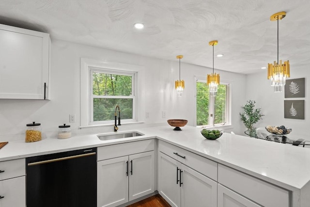 379 Dedham Ave, Needham, MA 02492 - kitchen featuring dishwashing machine, a sink, a peninsula, plenty of natural light, and recessed lighting