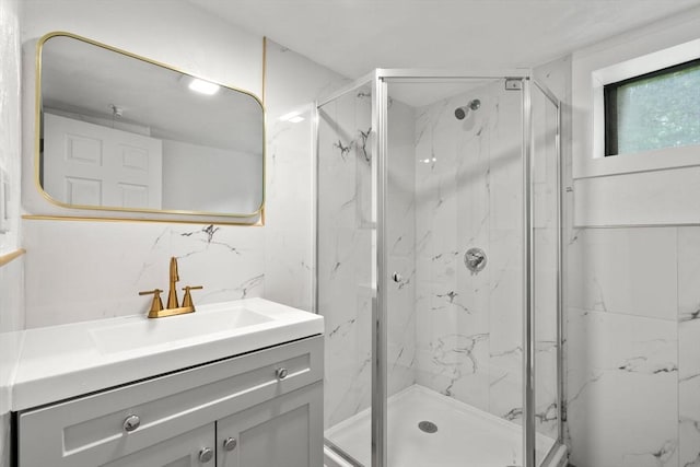 379 Dedham Ave, Needham, MA 02492 - bathroom featuring vanity and a marble finish shower