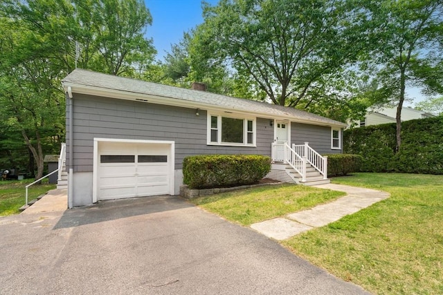 379 Dedham Ave, Needham, MA 02492 - ranch-style house featuring a front yard, a chimney, and driveway