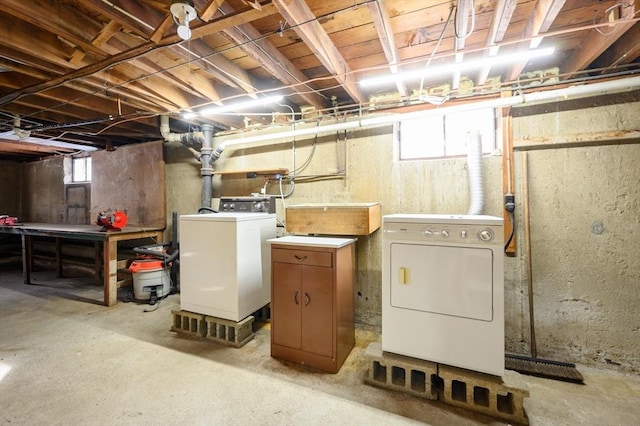 basement with washing machine and dryer