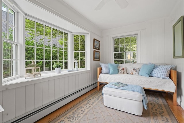 28 Pleasant View Rd, Arlington, MA 02476 - sunroom / solarium featuring a baseboard radiator and wood finished floors