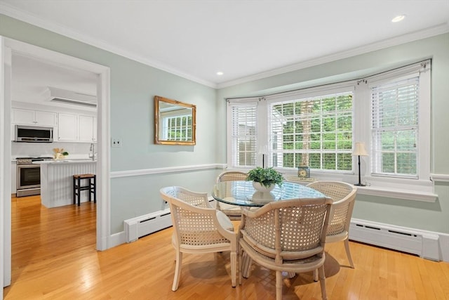 28 Pleasant View Rd, Arlington, MA 02476 - dining room featuring a baseboard radiator, light wood finished floors, crown molding, and recessed lighting