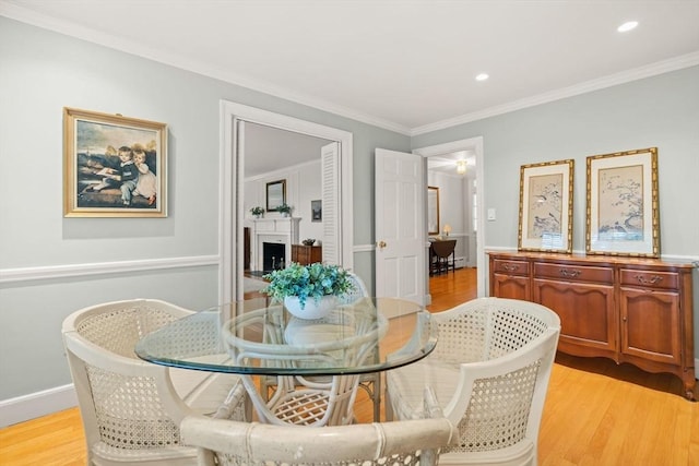 28 Pleasant View Rd, Arlington, MA 02476 - dining room with light wood-style flooring, crown molding, and recessed lighting