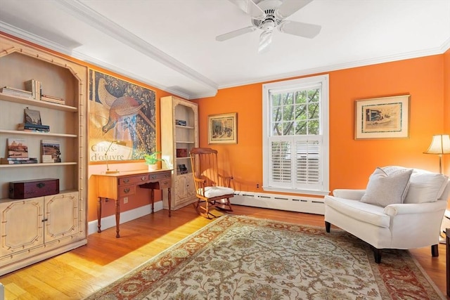 28 Pleasant View Rd, Arlington, MA 02476 - sitting room featuring baseboard heating, wood finished floors, ornamental molding, and ceiling fan