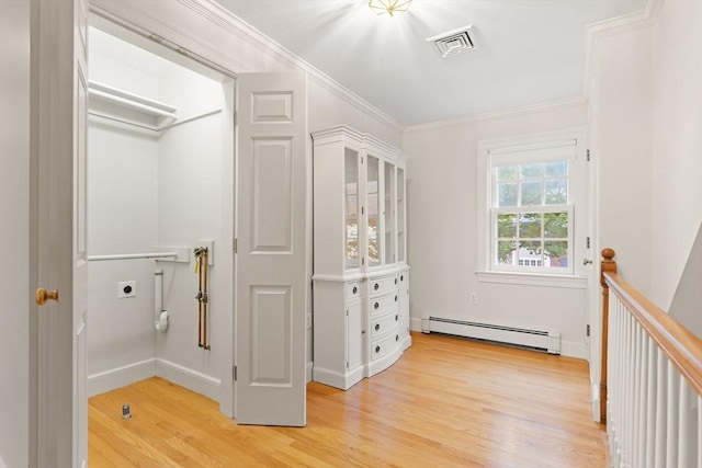 28 Pleasant View Rd, Arlington, MA 02476 - corridor with a baseboard heating unit, light wood-style flooring, and crown molding
