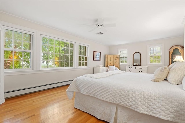 28 Pleasant View Rd, Arlington, MA 02476 - bedroom with a baseboard heating unit, light wood-type flooring, ornamental molding, and ceiling fan