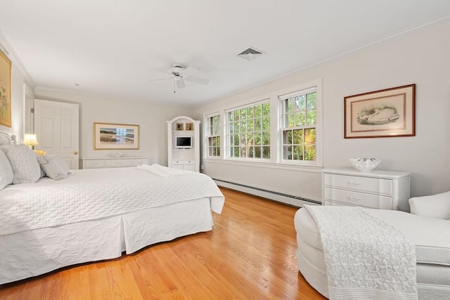 28 Pleasant View Rd, Arlington, MA 02476 - bedroom featuring a baseboard heating unit, ornamental molding, light wood-style floors, and ceiling fan