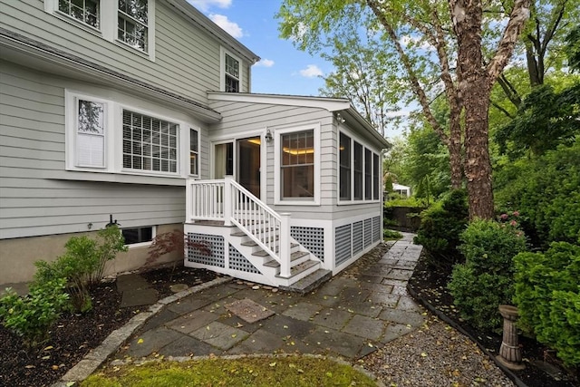 28 Pleasant View Rd, Arlington, MA 02476 - rear view of house with a sunroom and a patio area