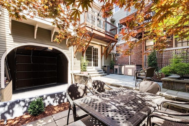 view of patio featuring a balcony