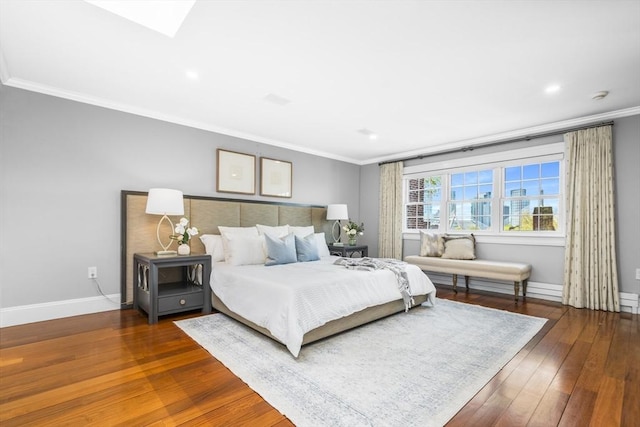 bedroom with dark hardwood / wood-style floors and crown molding