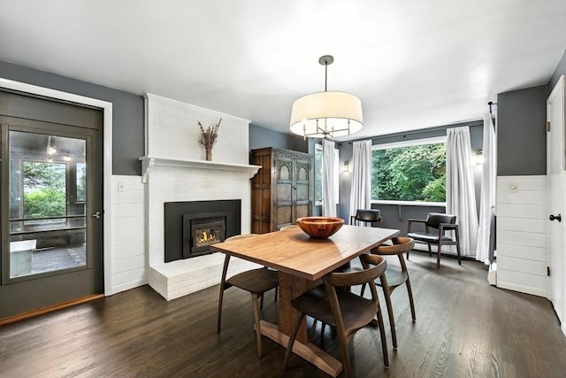 149 N Main St, South Hadley, MA 01075 - dining room featuring dark wood-style floors and a fireplace