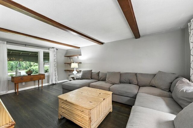 149 N Main St, South Hadley, MA 01075 - living area featuring beam ceiling and dark wood-style floors