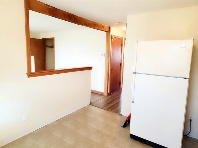 interior space with white fridge