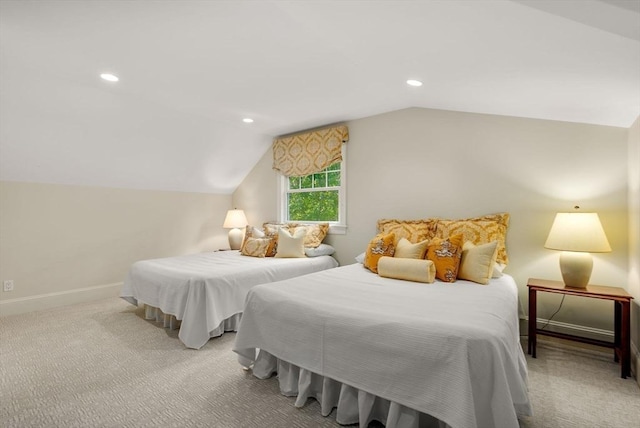 bedroom with recessed lighting, light colored carpet, vaulted ceiling, and baseboards