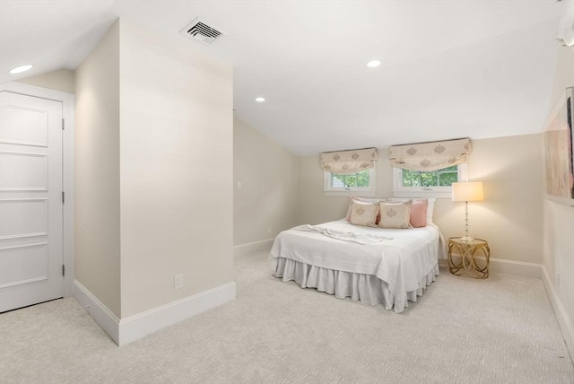 bedroom featuring lofted ceiling, recessed lighting, light colored carpet, visible vents, and baseboards