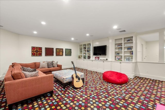 living room featuring built in features, carpet, recessed lighting, visible vents, and baseboards