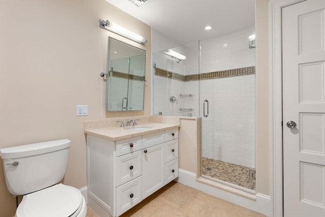 bathroom with recessed lighting, toilet, a shower stall, vanity, and tile patterned floors