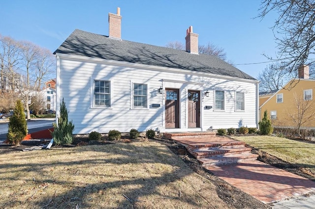 view of front of property with a front lawn