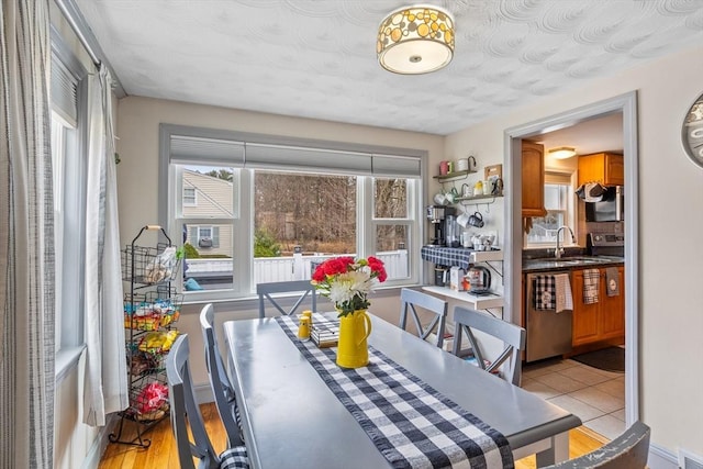 dining room featuring baseboards